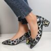 Newness Fierce Red Leopard Block Heel Pumps These chic pumps feature a striking red leopard print and a comfortable block heel perfect for any occasion