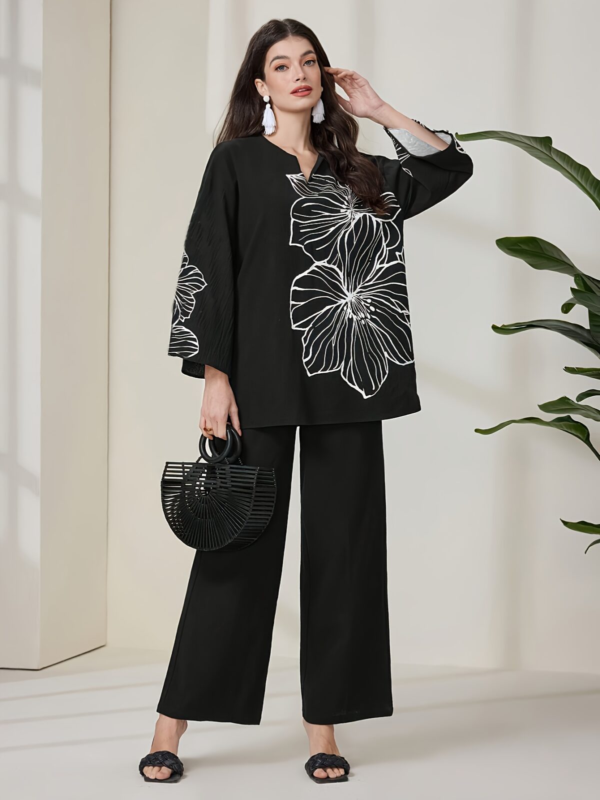 Embrace the autumn season in style with Newnesss Autumn Bloom Floral Print Set This chic two piece ensemble features a soft polyester fabric and a beautiful floral print perfect for effortless autumn fashion