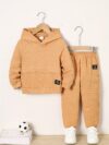 Newness Cozy Champ Boys Waffle Knit Set in soft waffle knit fabric featuring a hooded top and pants perfect for winter adventures