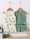 Adorable baby boy in a trendy Newness cactus print outfit featuring a waffle knit vest and pants Perfect summer clothes