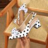 Classic black and white polka dot pumps from Newness perfect for adding a retro touch to any outfit