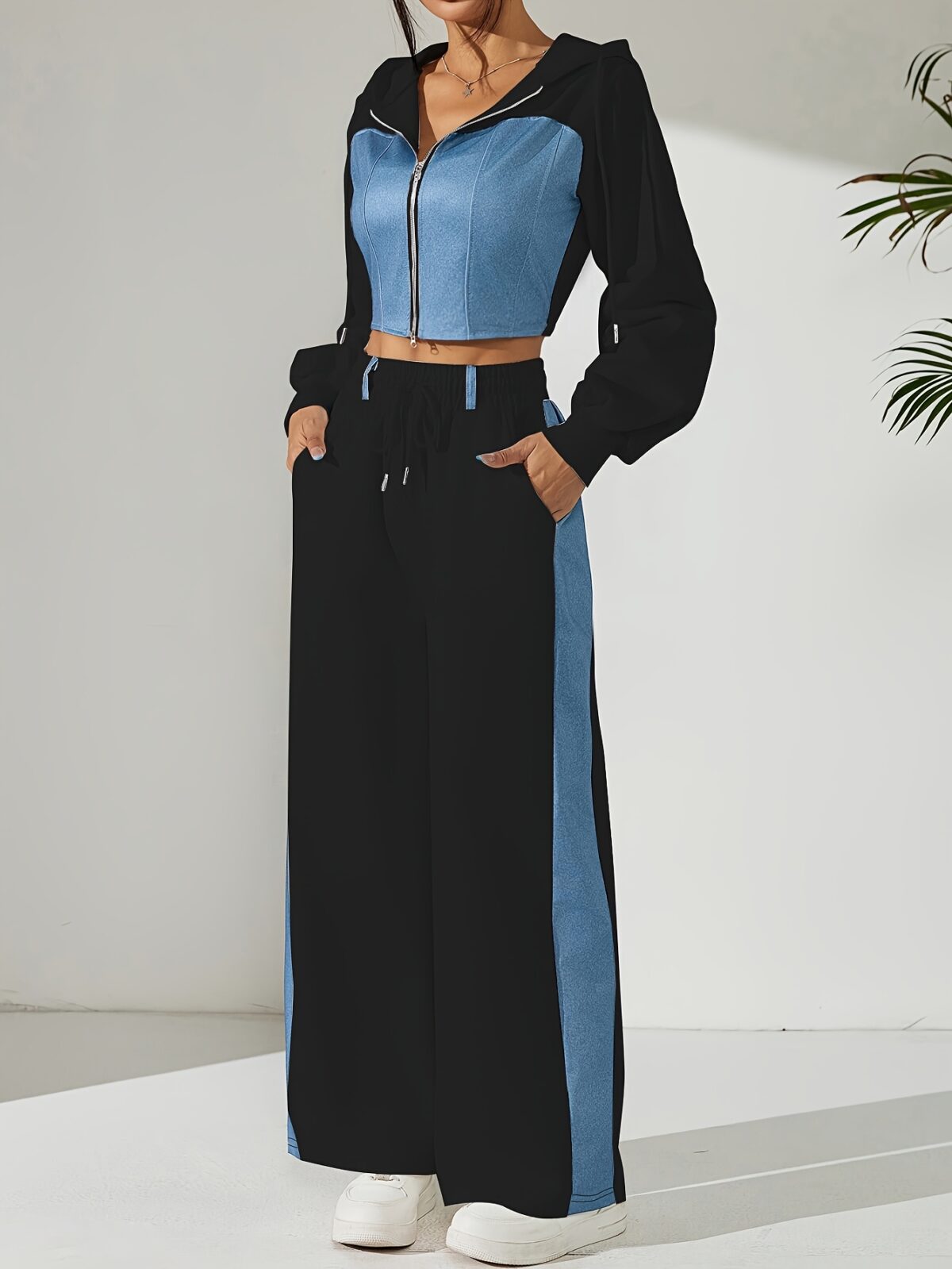 Skyline Chic Two Piece Set Flatlay of a stylish zip up hoodie and wide leg pants in a complementary color scheme Perfect for spring or fall