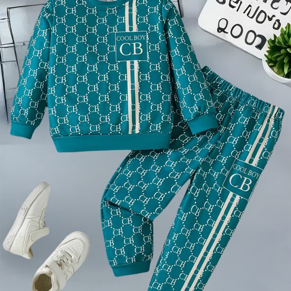 Stylish toddler boy wearing a trendy color block two piece outfit perfect for spring or autumn The outfit features a comfortable soft knit fabric in a vibrant color block design