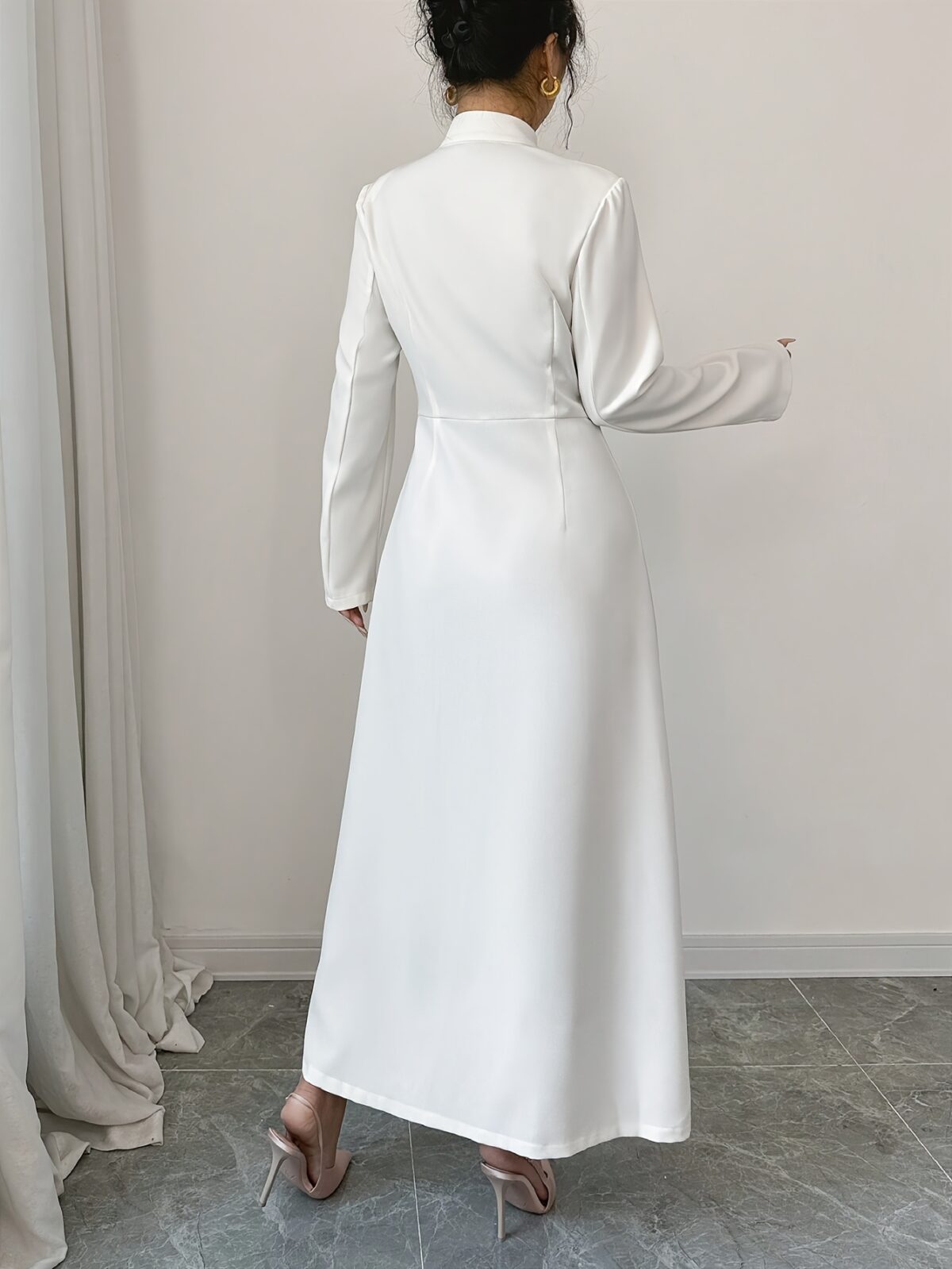 Flattering Timeless Chic Womens Stand Collar Tunic in versatile 100 polyester Featuring a chic stand collar and contrast button details this tunic offers elegance and comfort for all seasons