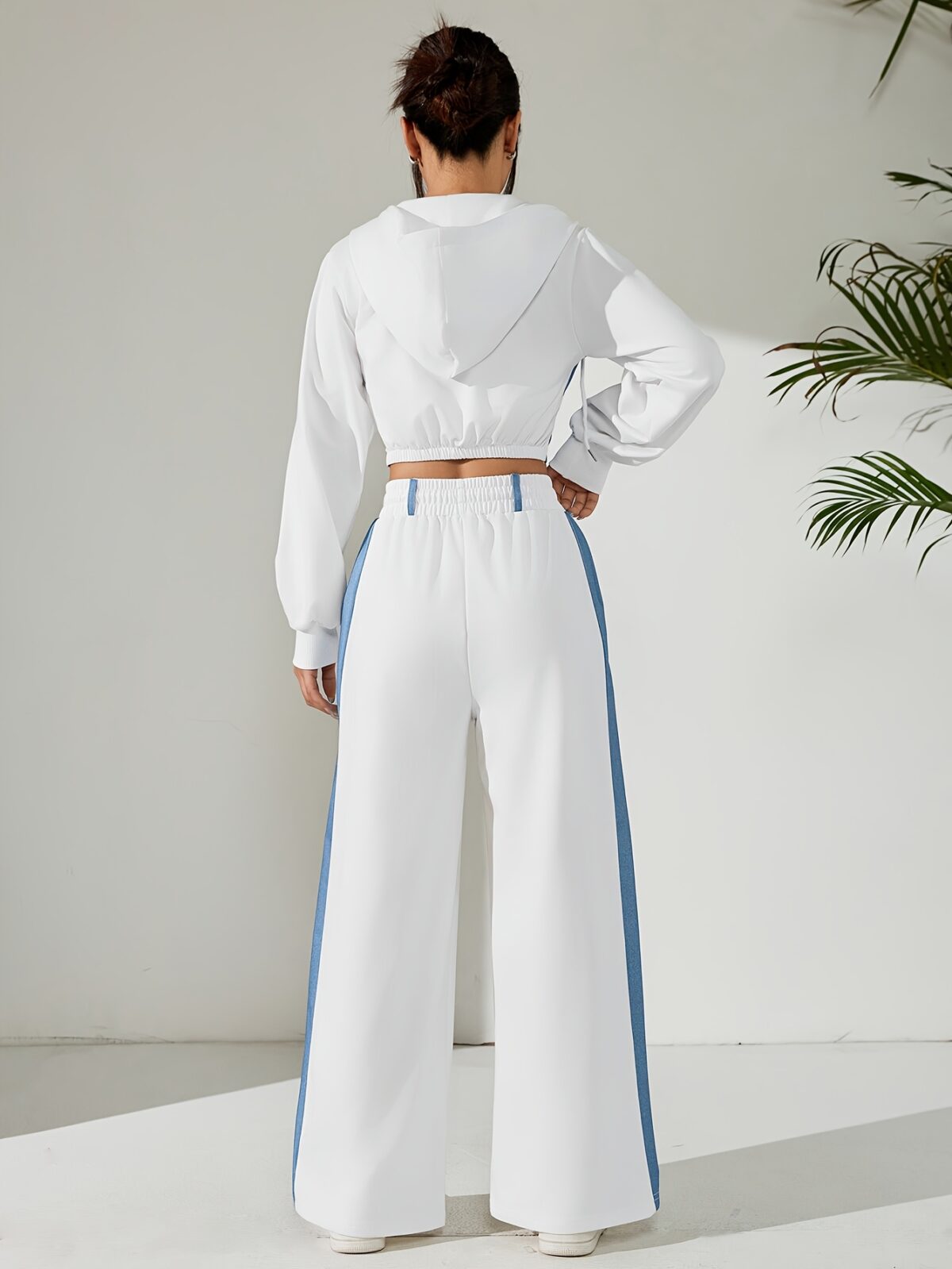 Skyline Chic Two Piece Set Flatlay of a stylish zip up hoodie and wide leg pants in a complementary color scheme Perfect for spring or fall