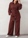 Effortless Chic Newness Belted Shirt and Pants Set in textured fabric Model showcasing the all season comfort and stylish silhouette