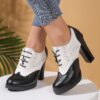 Elegant black lace up high heels with a block heel and ankle strap