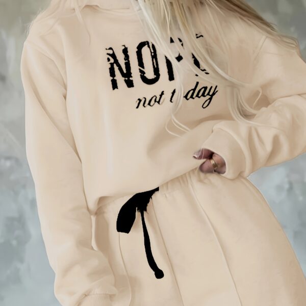 The Newness Effortless Chic Letter Print Lounge Set: A stylish and comfortable two-piece loungewear set featuring a relaxed, modern silhouette and a chic letter print.