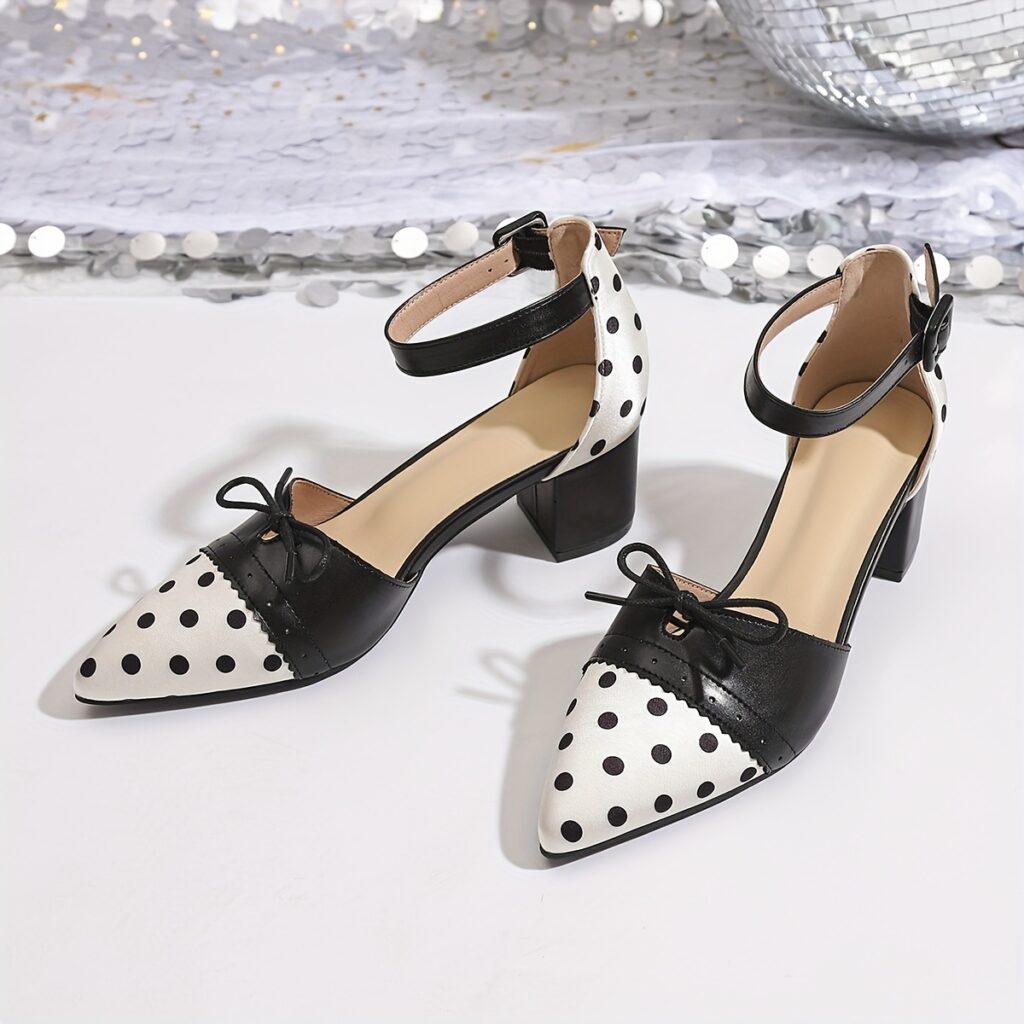 Chic Parisian Polka Dot Mary Janes from Newness. A stylish pair of black and white polka dot Mary Jane shoes, perfect for summer.