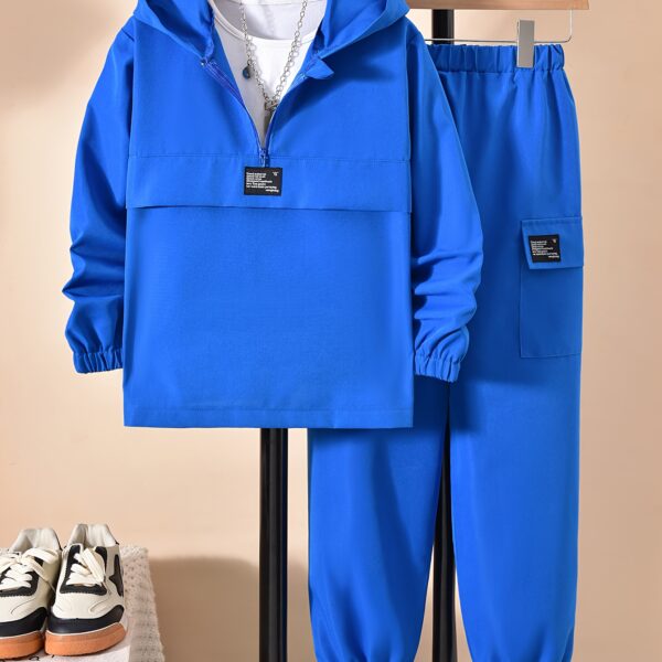 Stylish boy's camouflage zip-up hoodie and jogger pants set. Perfect for fall and winter.