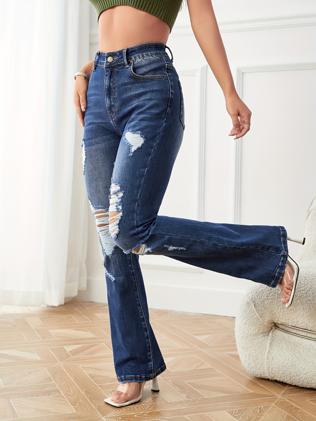 Santorini Ripped Flare Jeans by Newness Premium stretch denim jeans in a flattering flare style with stylish rips and tears