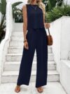 The Newness Riviera Navy Two Piece Set A stylish and comfortable navy blue two piece outfit perfect for spring and summer The image shows a model wearing the complete set