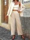 The Cairo Beige Pantsuit Set by Newness A modern and chic pantsuit in a versatile beige color perfect for any occasion Made with 100 comfortable polyester