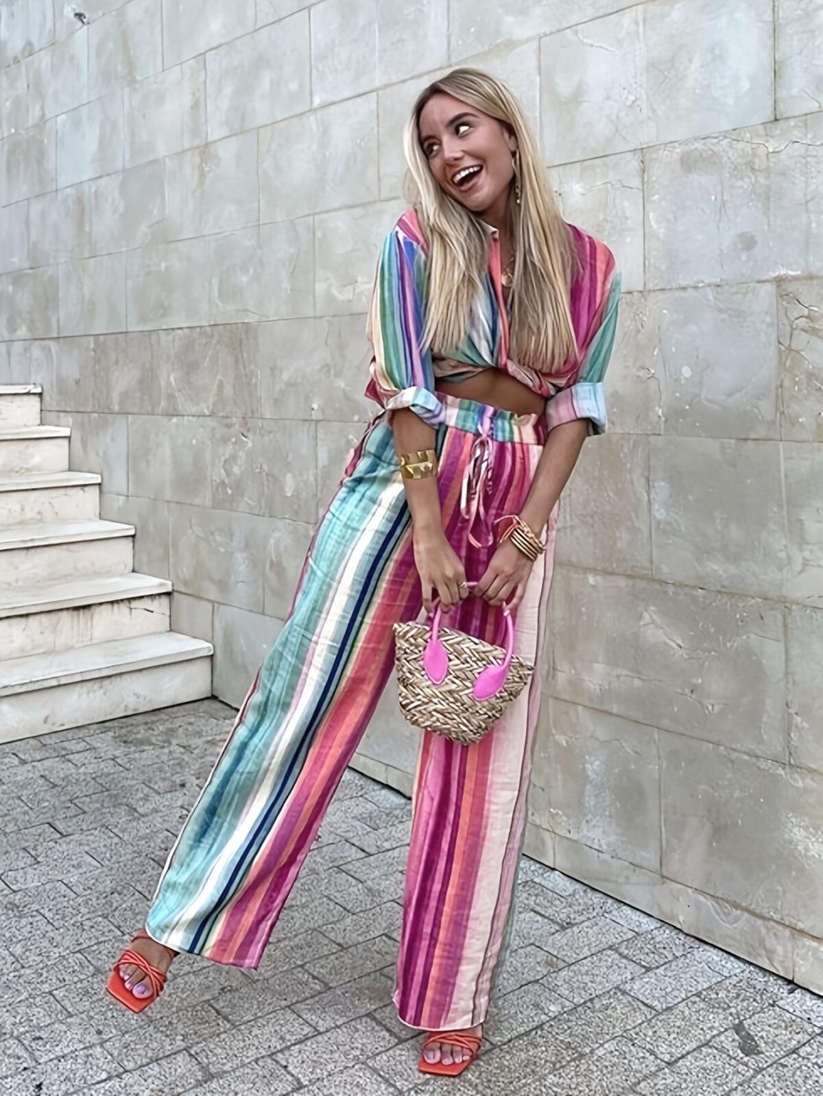 The Newness Riviera Striped Suit Set A chic spring outfit featuring a striped button up shirt and belted pants Perfect for any occasion