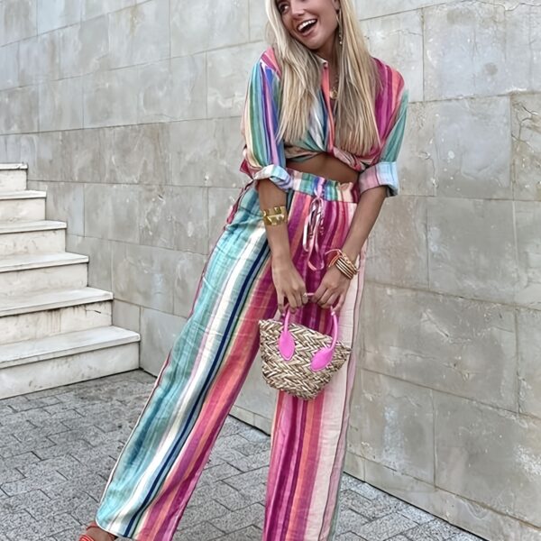 The Newness Riviera Striped Suit Set A chic spring outfit featuring a striped button up shirt and belted pants Perfect for any occasion
