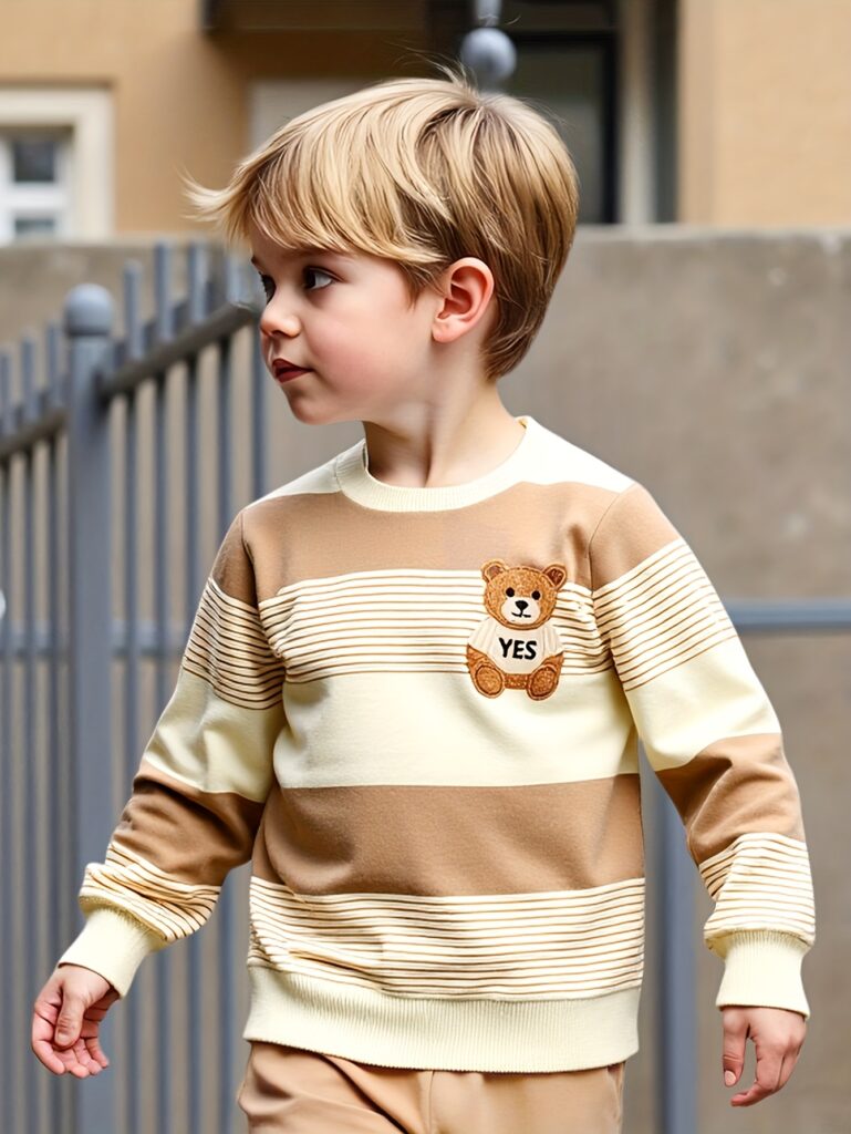Trendy Tikes Boys' Spring and Autumn Fashion Set: A stylish two-piece outfit featuring a cartoon bear and striped print top with cuffed pants. Perfect for boys aged 4-7.