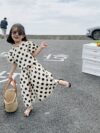 Adorable girls polka dot suit perfect for summer made from 100 soft cotton The suit features a mention specific details like sleeveless top and shorts or skirt design