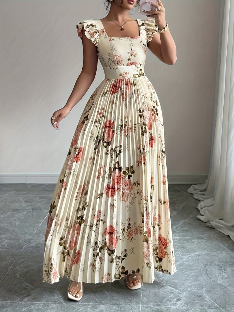 Effortlessly chic Newness Summer Bloom Floral Pleated Midi Dress, perfect for summer events.