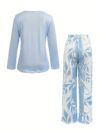Stylish woman wearing the Newness Parisian Chic Printed Pants Set showcasing the comfortable and chic design