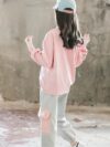 Adorable girls playful dolphin print suit in a comfortable loose fit perfect for spring and fall