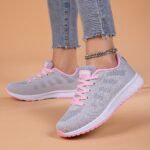 Womens pink accent lightweight breathable mesh running shoes with non slip MD sole