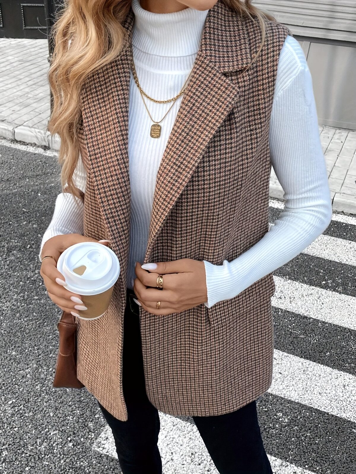 Newness City Chic Houndstooth Sleeveless Suit Jacket A stylish houndstooth sleeveless jacket perfect for layering over dresses or blouses during FallWinter Versatile and chic
