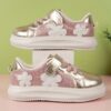 Adorable girls pink and white floral sneakers perfect for play or everyday wear Twinkle Toes brand