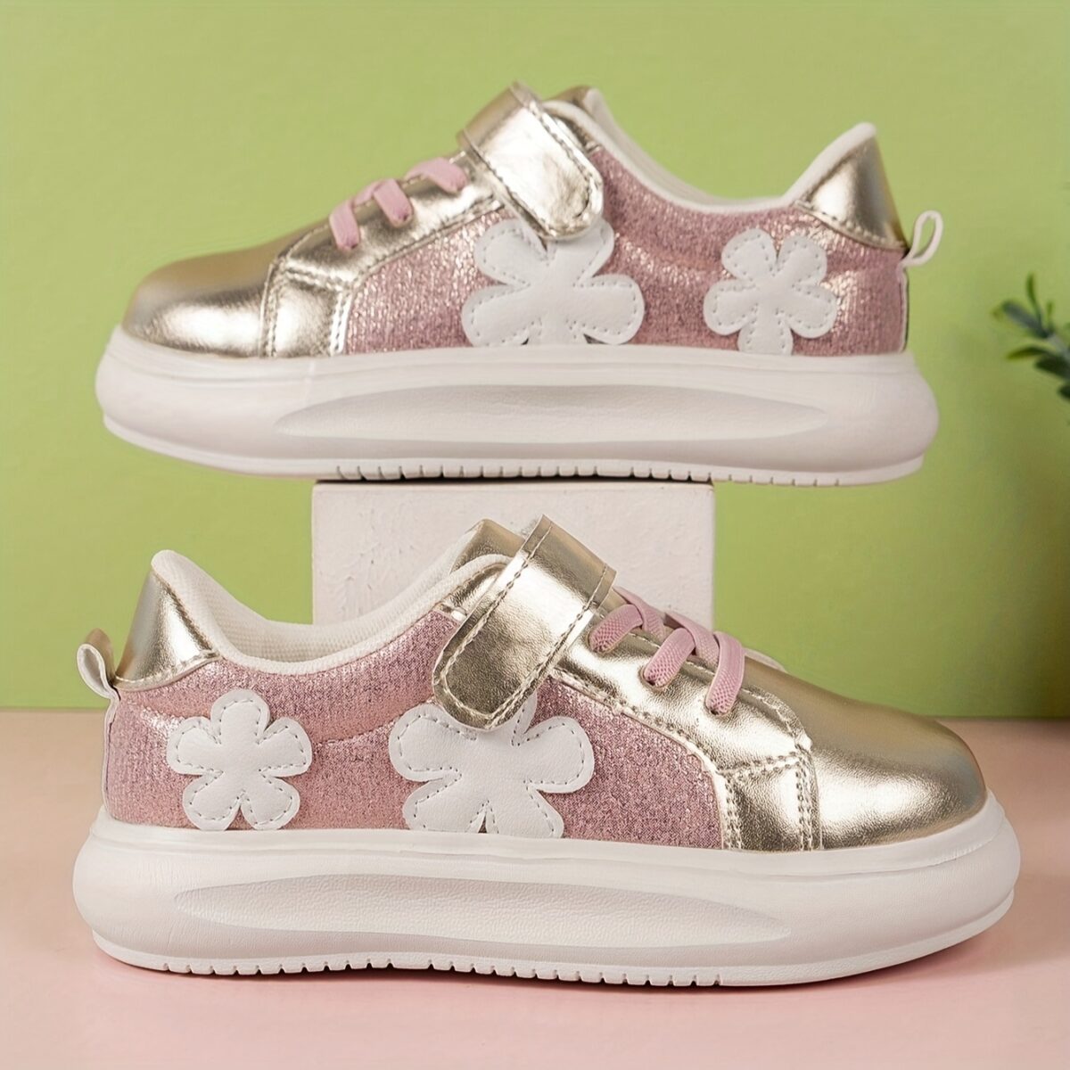 Adorable girls pink and white floral sneakers perfect for play or everyday wear Twinkle Toes brand