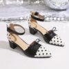 Chic Parisian Polka Dot Mary Janes from Newness A stylish pair of black and white polka dot Mary Jane shoes perfect for summer