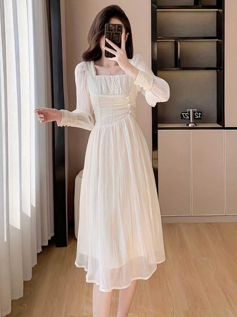 Effortlessly chic woman wearing the Newness Etoile Parisian Chic Square Neck Midi Dress, showcasing its flattering silhouette. The dress is perfect for any occasion.