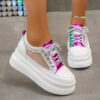 Newness Elevated Edge Chunky Platform Sneakers in white showcasing the chunky platform sole modern design and breathable fabric The shoes are styled on a models feet emphasizing their comfortable and confident lift