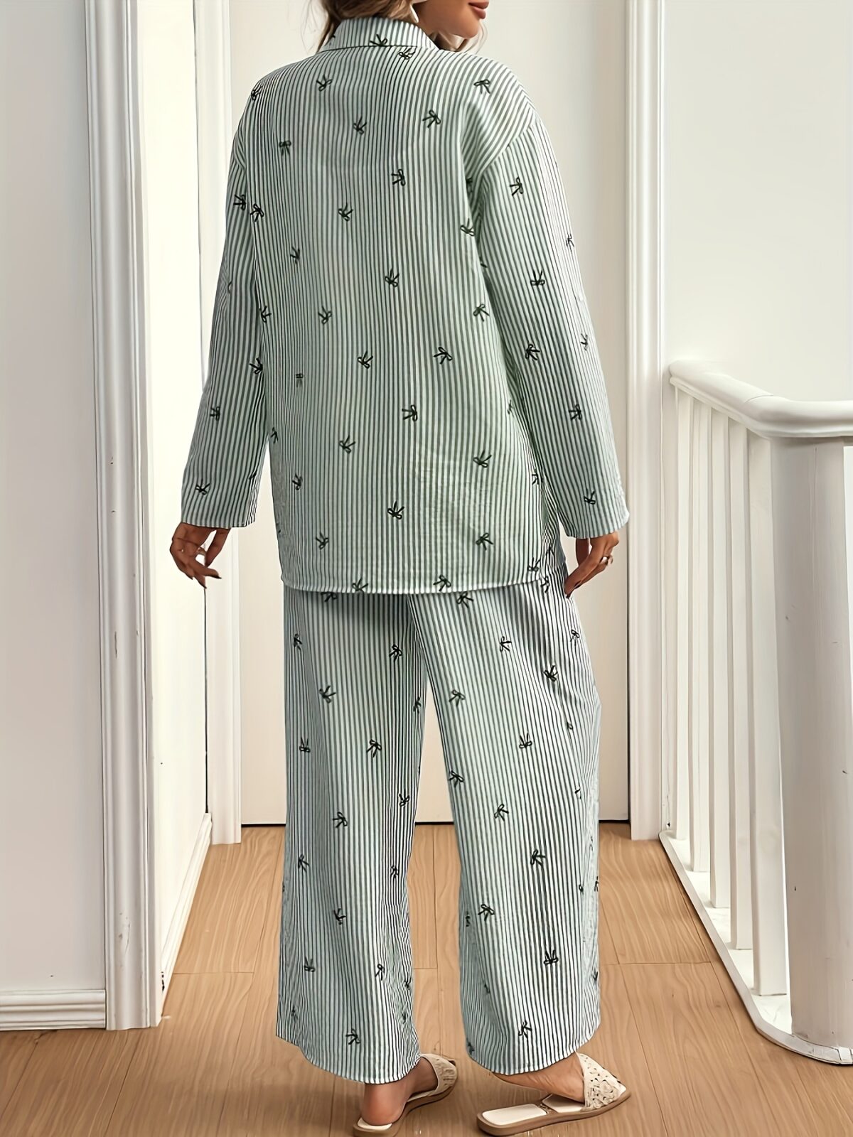 Effortless Chic The Parisian Striped Lounge Set in soft polyester A stylish two piece set perfect for relaxing at home Model wearing the matching striped top and pants