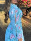 Embrace Parisian chic in the Newness Azure Bloom Floral Print Dress This stunning summer dress features a vibrant floral print