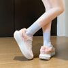 Stylish and comfortable womens breathable mesh sneakers in white showcasing the airy mesh upper and modern design Perfect for everyday wear or workouts