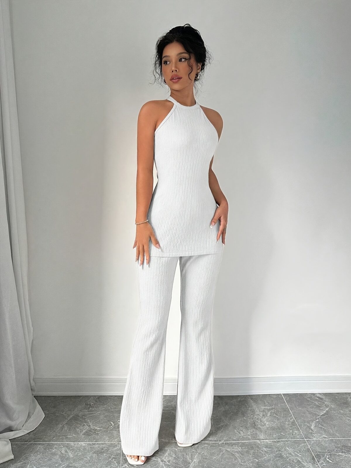 Effortless Chic Sleeveless Knit Set in luxurious polyester Flattering silhouette perfect for any occasion