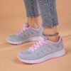 Womens pink accent lightweight breathable mesh running shoes with non slip MD sole