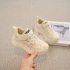 Stylish beige and white Active Ace Kids breathable casual sneakers with soft EVA sole and A branding perfect for boys and girls aged 14 and under