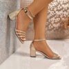 Newness Celestia Gold Braided Block Heel Sandals Chic gold braided sandals with a comfortable block heel perfect for any occasion