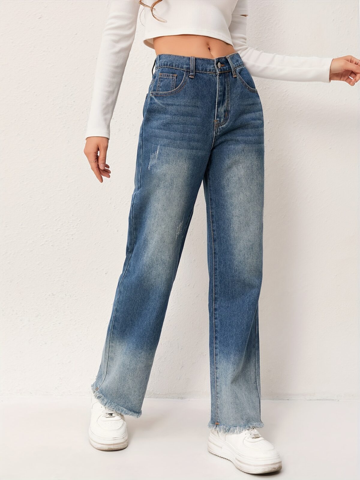 Newness Effortless Chic Straight Leg Jeans Flattering straight leg jeans in a versatile wash designed for both comfort and style Model showcases the perfect fit and drape
