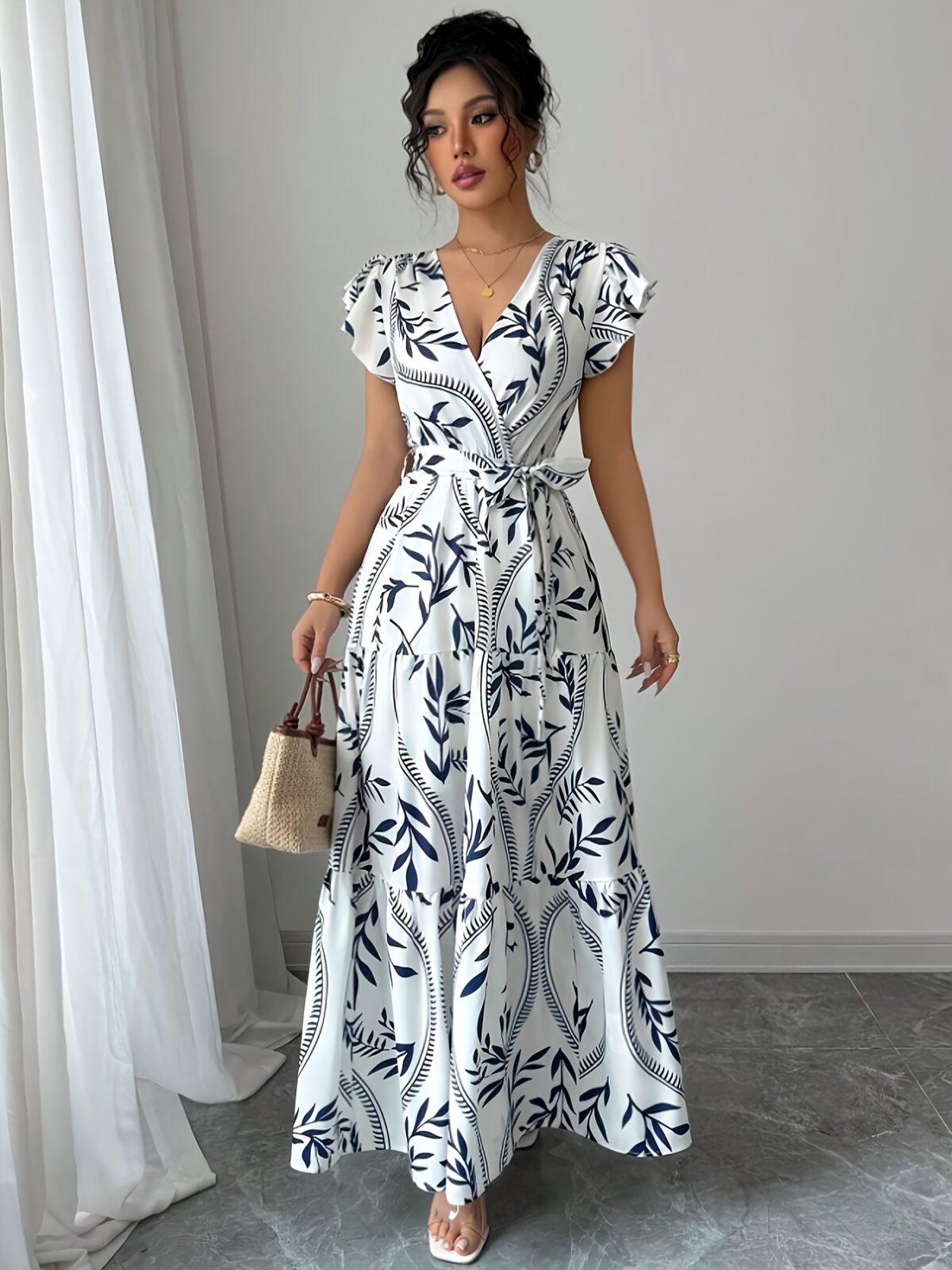 Embrace summer in the Newness Casablanca Floral Print Maxi Dress A chic flowing maxi dress with a vibrant floral print perfect for any occasion