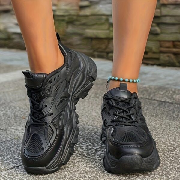 Newness Metropolitan Black Platform Sneakers Elevate your style with these chic and comfortable black platform sneakers perfect for any occasion