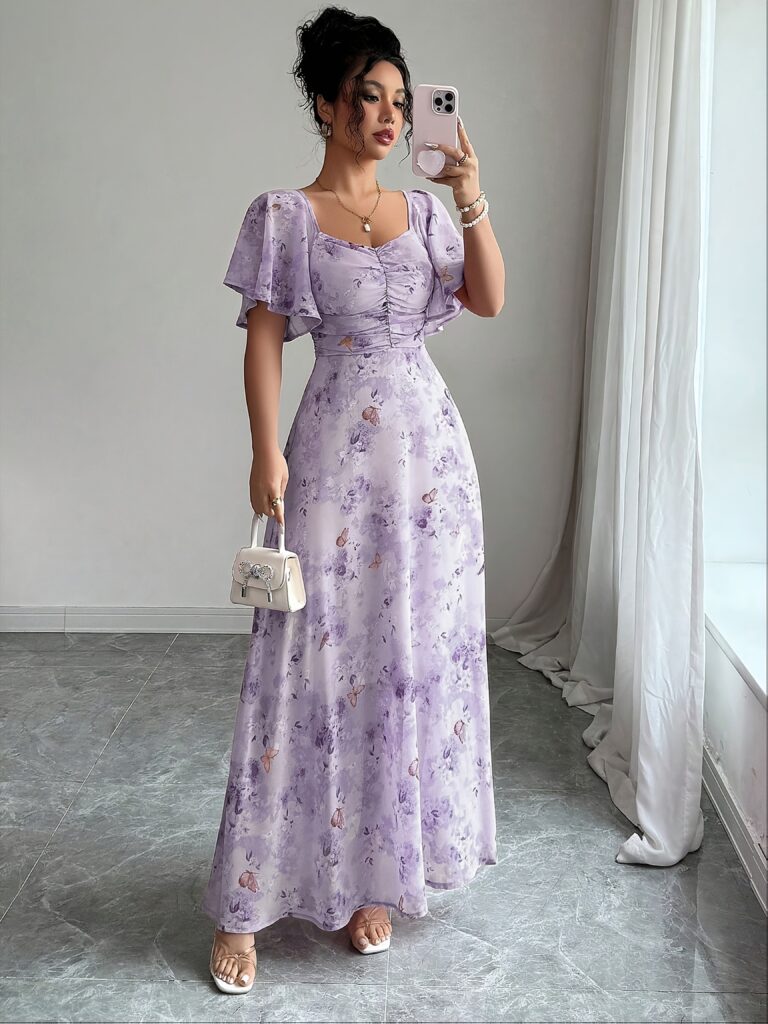 Model wearing the Newness Ethereal Bloom Floral Print Maxi Dress, a flowing maxi dress with a delicate floral print, posing gracefully.