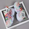 Newness Prism Rainbow Stripe Sneakers A vibrant pair of rainbow striped sneakers showcasing breathable comfort and stylish design perfect for all day wear