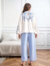 Girl wearing a whimsical floral print outfit ideal for spring and autumn