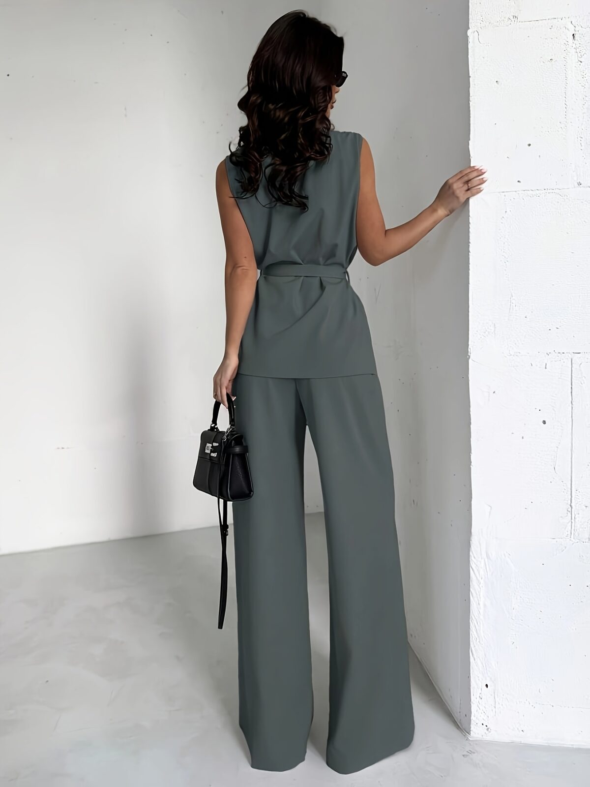 Model wearing the Newness Dubai Breeze Elegant Wide Leg Set a stylish two piece outfit featuring wide leg pants and a coordinating top perfect for any occasion