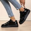 Newness Sleek  Chic Womens Glossy Sneakers in white showcasing their glossy finish and comfortable design Perfect for effortless style