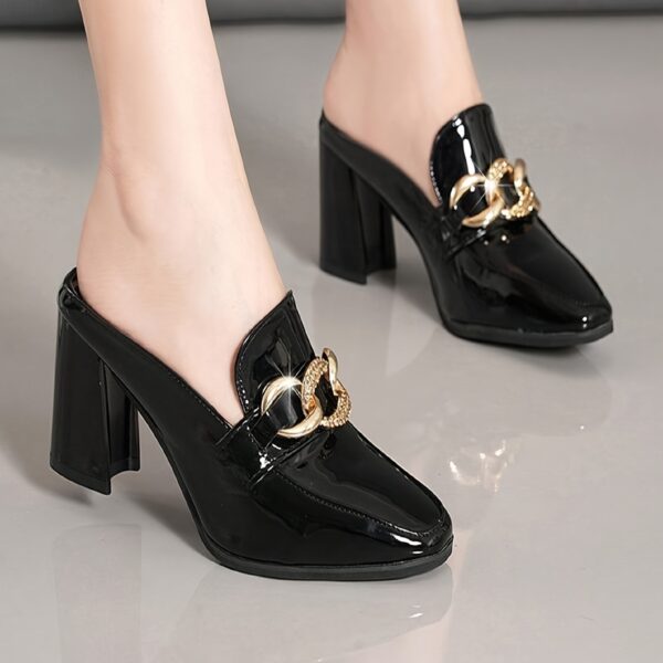 Black square toe pumps with a delicate chain detail and a comfortable block heel Newness Timeless Chic collection