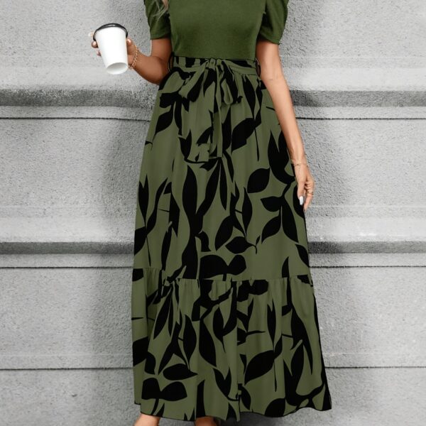 Model wearing the Newness Timeless Chic Print Midi Dress, a versatile and stylish midi dress perfect for any occasion.