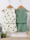 Adorable baby boy in a trendy Newness cactus print outfit featuring a waffle knit vest and pants Perfect summer clothes