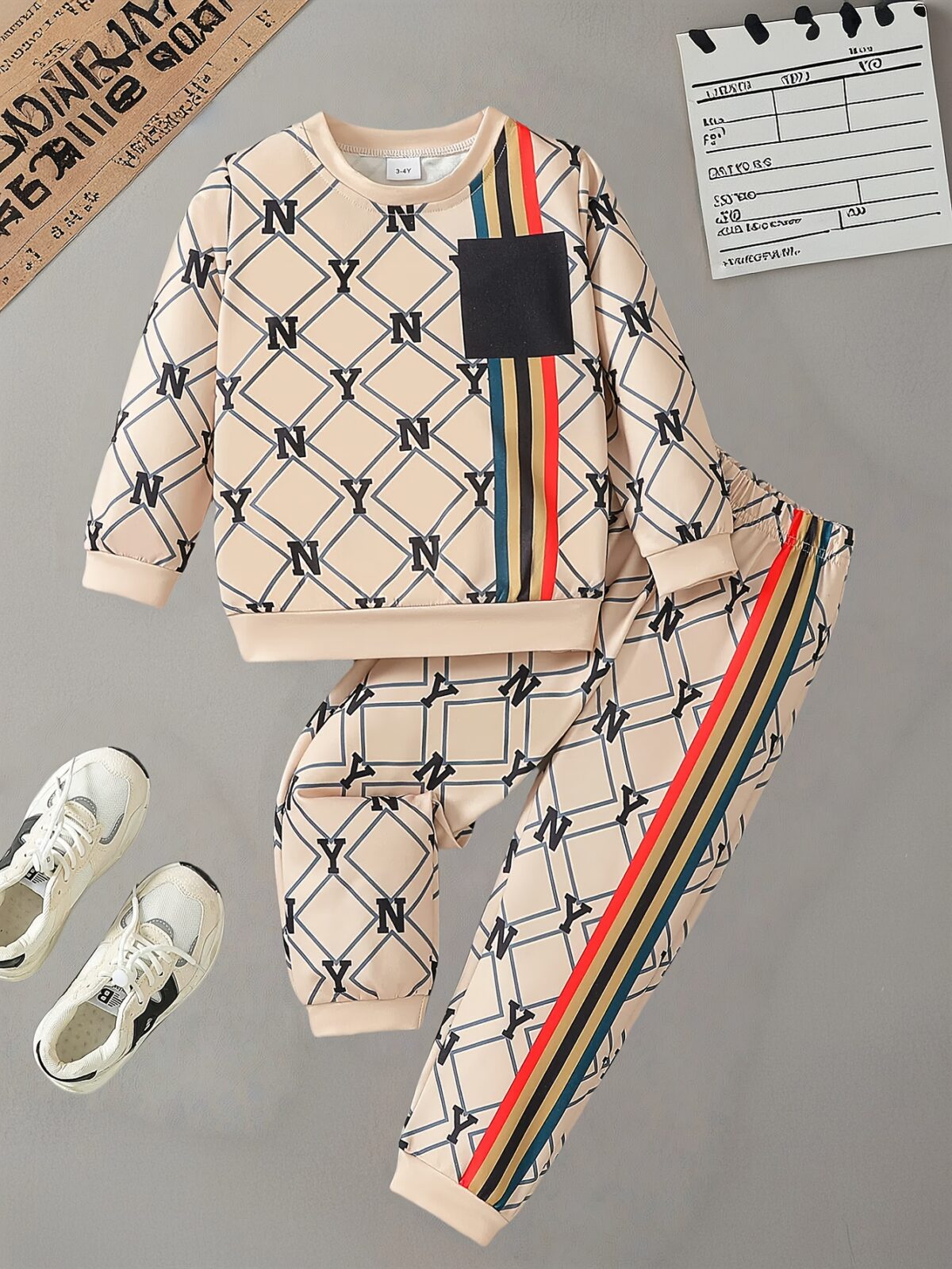 Stylish boys two piece outfit featuring a trendy N Y English letter print long sleeve t shirt and matching pants Perfect for city adventures and everyday wear
